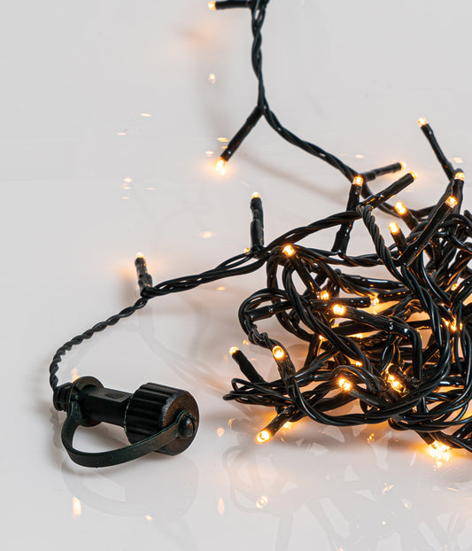 1000Led Amber Λαμπάκια Με Πρόγραμμα,Επέκταση Και Μετασχηματιστή Ip44 ,Πράσινο Καλώδιο/Θερμό Λαμπάκι (5cm Απόσταση) 50 Μέτρα (Kelvin: 2.100 - 2.300) Με Καρούλι Αποθήκευσης