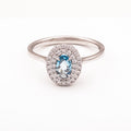 Λευκόχρυσο δαχτυλίδι Κ14 ροζέτα με πέτρα blue topaz Νο 55.