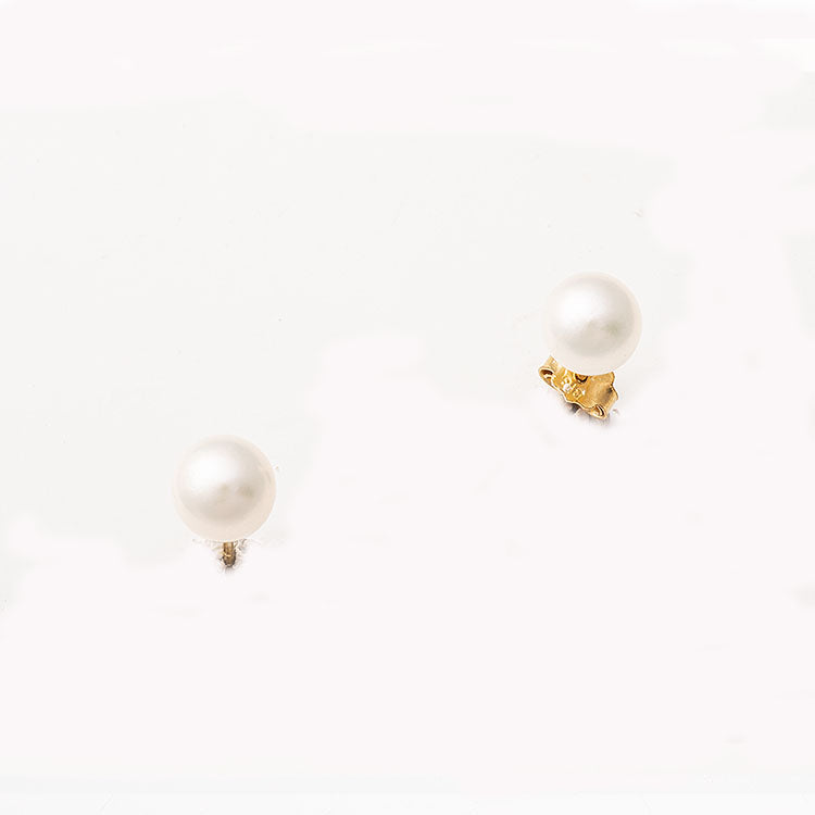 Καρφωτά σκουλαρίκια χρυσά Κ14 με στρογγυλά μαργαριτάρια 7.0mm.